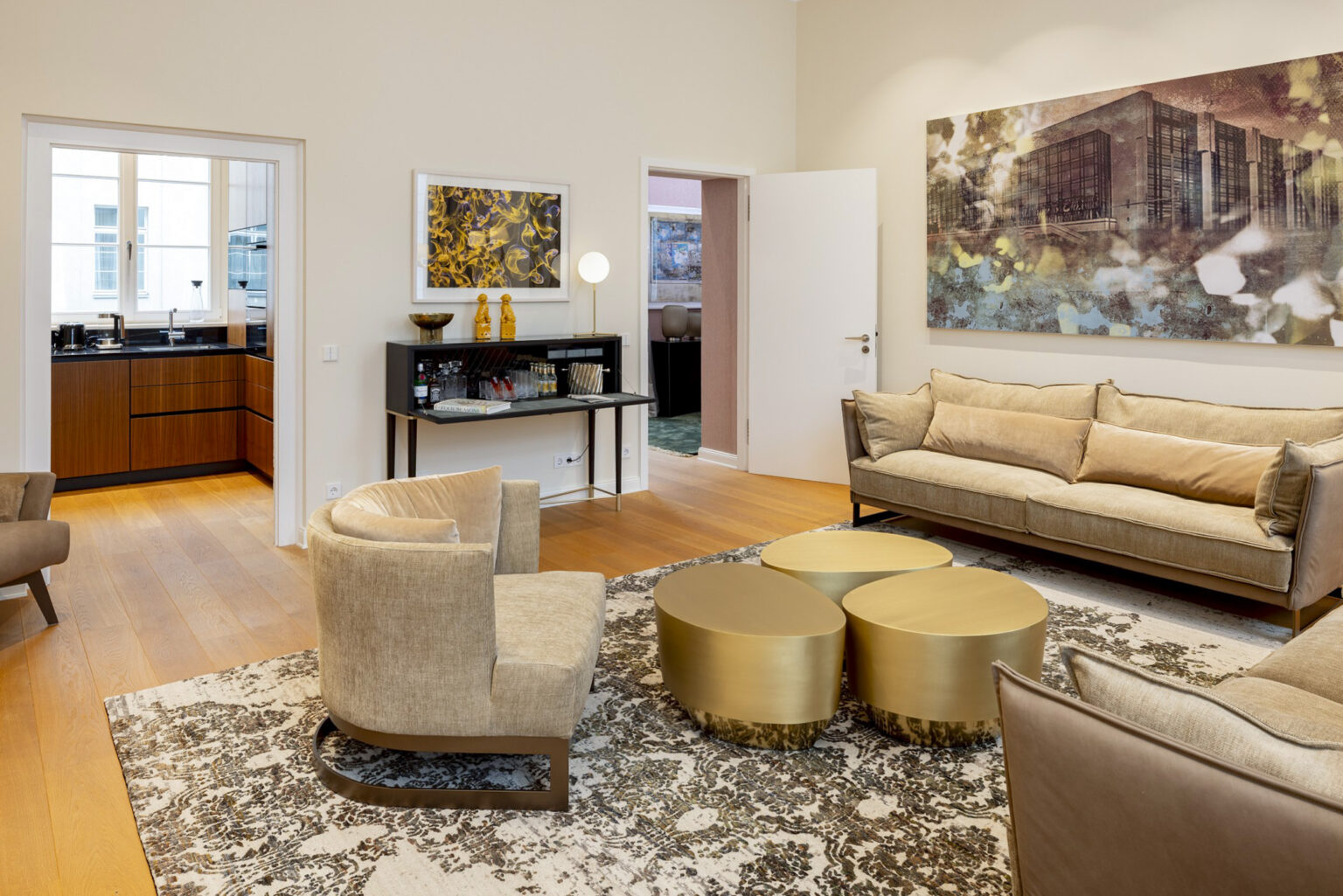 Luxurious living room with works of art in the Heritage Presidential Suite at THE WELLEM Hotel Düsseldorf